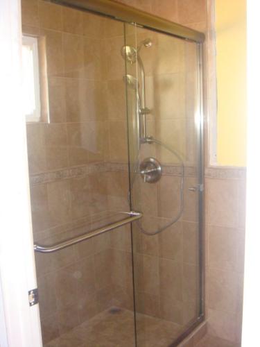 shower enclosure and rail